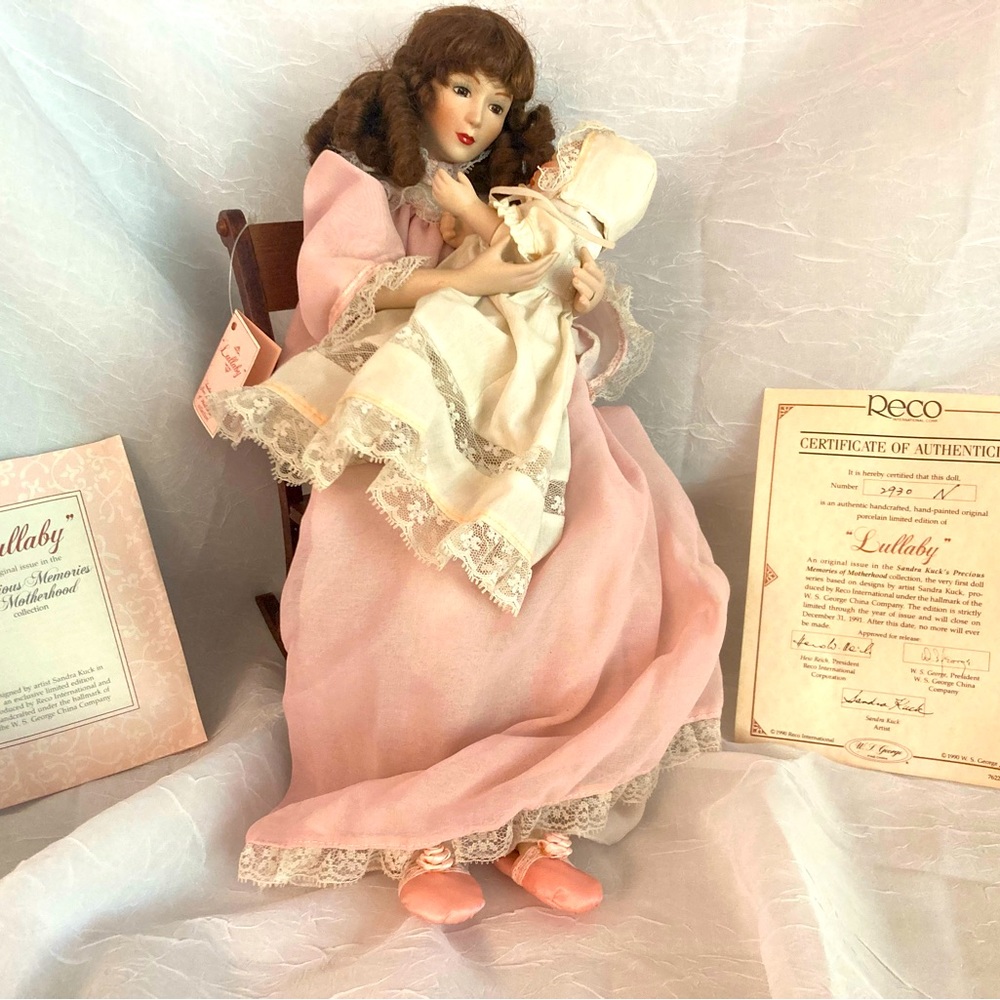 Lullaby Mother and daughter Porcelain dolls in wood rocking chair.  Ashton Drake